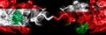 Lebanon vs Oman, Omani smoky mystic flags placed side by side. Thick colored silky abstract smoke flags