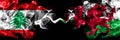 Lebanon vs Wales, Welsh smoky mystic flags placed side by side. Thick colored silky abstract smoke flags