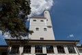 Lebork, Pomeranian Voivodeship / Poland - June 6, 2019: Renovated antique water tower in a small town. An old building supplying