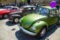 Lecce, Italy - April 23, 2017: Row of colourful vintage classic retro automobiles cars with color baloons