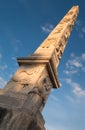 Obelisk close to Porta Napoli, historic gate to the city of Lecce in Puglia, Southern Italy.