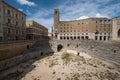 Remains of Roman amphitheatre in Piazza Sant`Oronzo, in the centre of the historic city of Lecce, Puglia, Southern Italy. Royalty Free Stock Photo