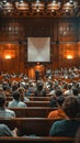 Lecture Hall Filled With Audience and Projector Screen Royalty Free Stock Photo