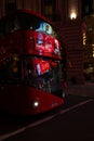 LED billboard lights, reflected on front windows of London Bus. Piccadilly Circus, London. Royalty Free Stock Photo