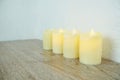 LED Candle Light electronic on wooden background