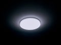 LED ceiling light glowing at night darkness bathroomlight ceilingmounted LEDlamp LEDlight plafonnier lampara techo luz teto photo Royalty Free Stock Photo