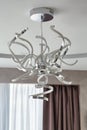 LED chandelier in modern living room. Royalty Free Stock Photo