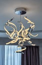 LED chandelier in modern living room. Royalty Free Stock Photo