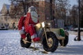 LED Christmas illumination of Santa Claus riding a vintage bicycle, Topacz, Poland. . Royalty Free Stock Photo