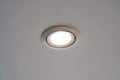 LED downlight or ceiling light Installed on a gray ceiling.