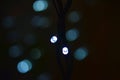 Led electric garland and bokeh light reflections Royalty Free Stock Photo