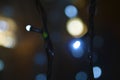 Led electric garland and bokeh light reflections Royalty Free Stock Photo