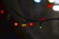 Led electric garland and bokeh light reflections Royalty Free Stock Photo