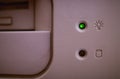 Led green light on vintage computer case background Royalty Free Stock Photo