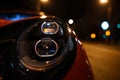 LED headlights of new generation cars at night.