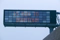 LED highway sign displays 15 minutes to downtown showing how much traffic on Highway 101, Los Angeles, California Royalty Free Stock Photo