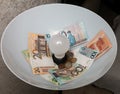 LED lamp and Belarusian money and coins in the plafond. Royalty Free Stock Photo