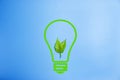 LED lamp with green leaf Royalty Free Stock Photo