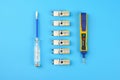 .LED lamps with an electrician tool on a blue background Royalty Free Stock Photo