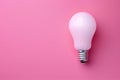 Led light bulb on pink background, minimal concept studio photography Royalty Free Stock Photo