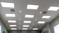 Led panel lamp on modern office ceiling