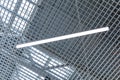 LED lighting lamp on the ceiling of an commercial building. Grid ceiling make nice architectural interior false ceiling view or Royalty Free Stock Photo