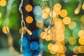 LED lights garland, colorful light bulbs on a bokeh background Royalty Free Stock Photo