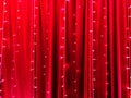 LED lights on red certain fabric backdrop as the abstract background