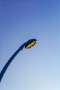 Led street lamp isolated on blue sky with sunset Royalty Free Stock Photo