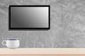 LED television screen mockup, blank hdtv on concrete wall with coffee cup in the room