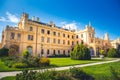 Lednice Chateau with beautiful gardens and parks on sunny summer day. Lednice-Valtice Landscape, South Moravian region. UNESCO W Royalty Free Stock Photo