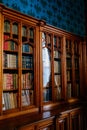 Lednice, Southern Moravia, Czech Republic, 04 July 2021: Castle interior with neo-gothic wooden carved ceiling and furniture,