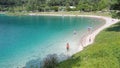 Ledro, Italy. The Ledro lake and Its beaches. A natural alpine lake. Amazing turquoise, green and blue colors. Italian Alps. Italy