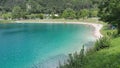 Ledro, Italy. The Ledro lake and Its beaches. A natural alpine lake. Amazing turquoise, green and blue colors. Italian Alps. Italy