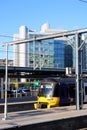 Leeds city skyline, electric train Leeds station