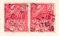 Old red french postage stamp with an illustration of a stylized african woman commemorating a colonial exhibition in 1931