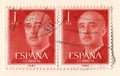 A pair of old red vintage postage stamps with an image of general franco Royalty Free Stock Photo