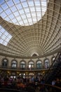 Leeds Corn Exchange grand interior with a wide angle lens and sunlight casting dramatic shadows