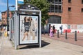 Dorothy Perkins female ladies fashion clothing poster advert on the side of a bus stop