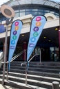 Mecca Bingo logo on banners outside entrance to building. Company logo and signage