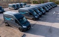Row of new Ford E-Transit vans with Amazon Prime livery