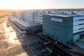 Aerial view of the exterior of a large Amazon Prime warehouse