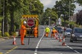 LEEDS, UK - 12 JULY 2017 Workmen painting lines on road