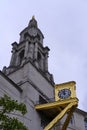 Vertical Image of Leeds Civic Hall with a bright golden clock