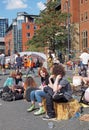 People sitting in the street at the extinction rebellion protest blocking victoria road and bridge in leeds