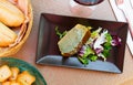 Leek pie with sauce and greens Royalty Free Stock Photo