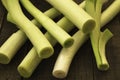 Leeks on a wooden table Royalty Free Stock Photo