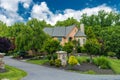 Luxurious red brick country house for a large family. with a large lawn and landscaping