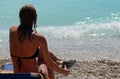 Lefkada, Greece, 16 July 2018, A beautiful woman admires the turquoise sea of Porto Katsiki, Lefkas