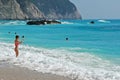 Lefkada, Greece July 16 2018, A tourist relaxes on the beach and the sea of Porto Katsiki Royalty Free Stock Photo